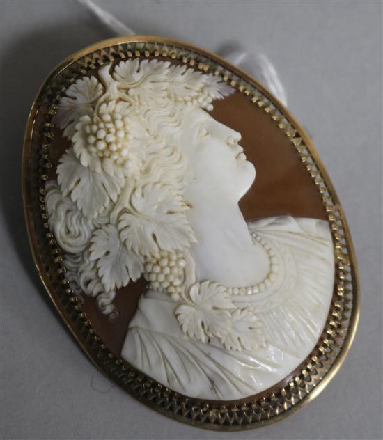 A 19th century Italian cameo brooch, carved with a Bacchante, 57mm.